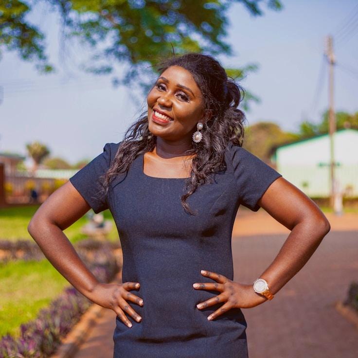 Kaveri Mehta, Lead Design Curator at HarborLumenField, reviewing corporate floral arrangements